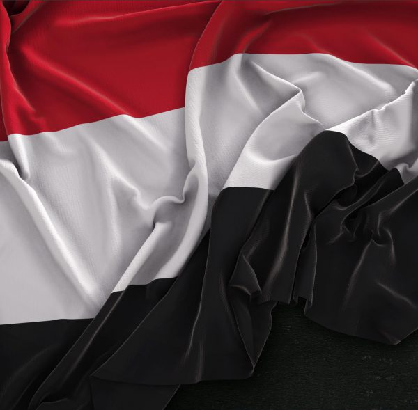 Yemen Flag Wrinkled On Dark Background 3D Render
